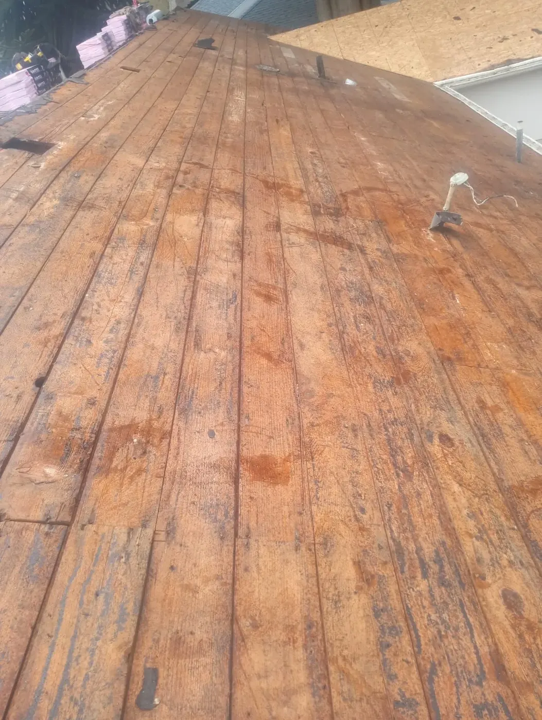Plank decking cleaned and prepared for the new metal system