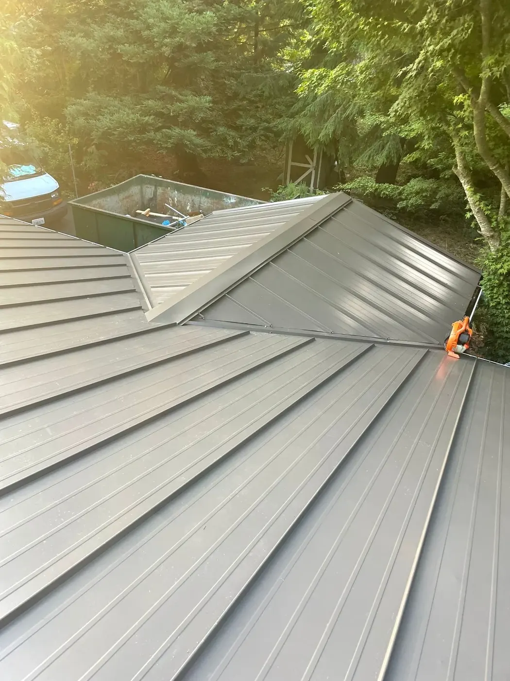 Completed standing-seam metal roof with clean panel lines