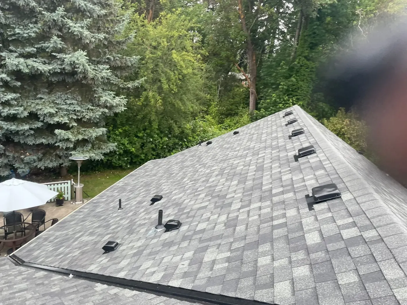 Finished light gray architectural shingle roof