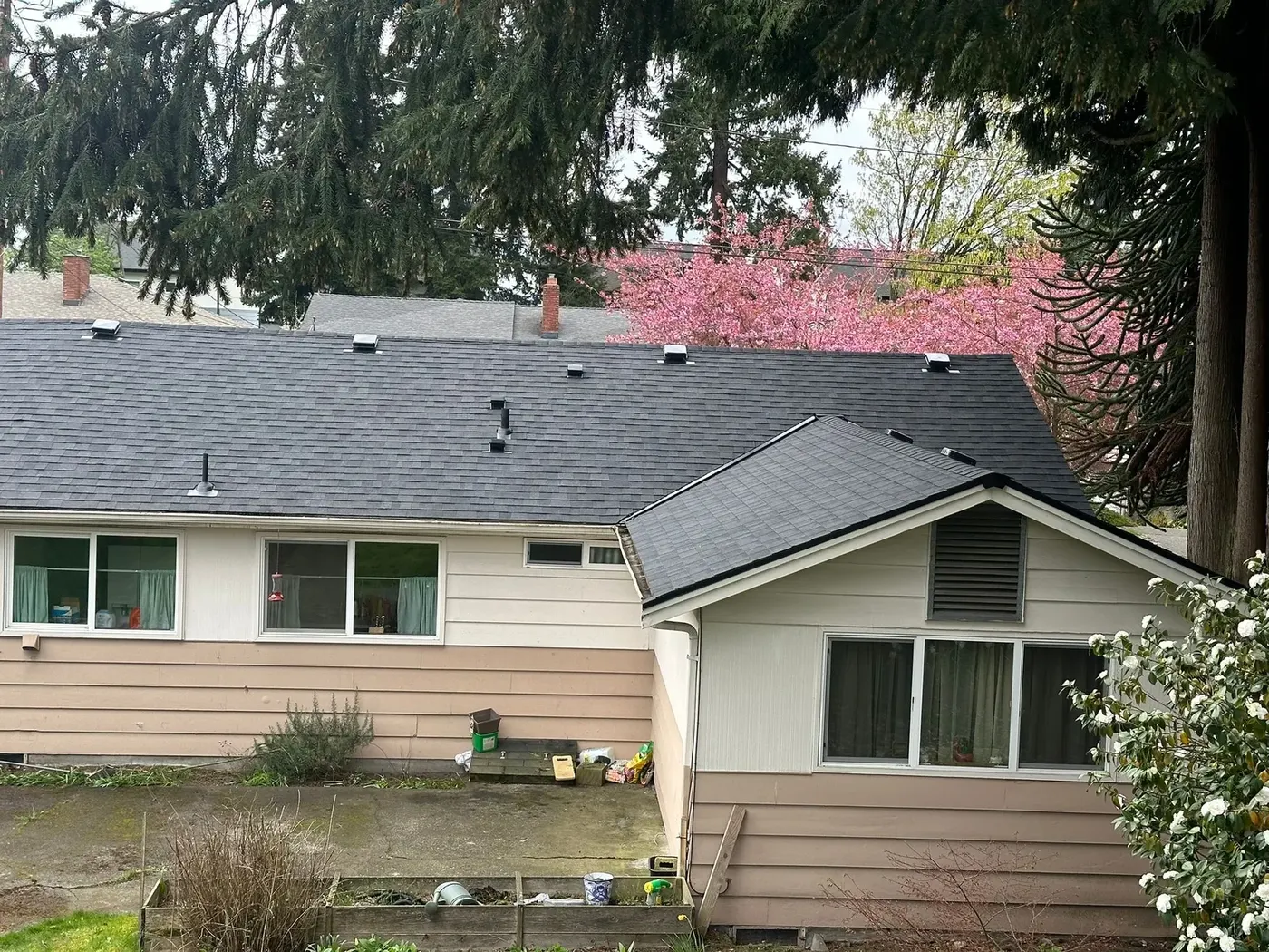 Seattle-area single-family home with a freshly completed dark composition roof